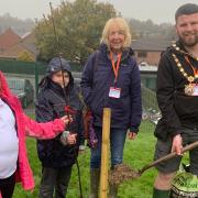 Bishop's Castle Primary School's Gardening Club members Evie and Josh with tree warden Sue Cooper and Mayor Cllr Josh Dickin at the planting of the Charter Oak.