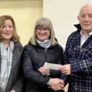 Roy Morgan, from Llandrindod, presented the first cheque to Tessa Bradley and Anna Potgieter from Llandrindod Wells Foodbank. The choir’s serving president, Michael Bennett, presented the next cheque to Natalie Vane and Linda Knox from The Arches.