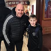 Jack Davies from Bishop's Castle with Wales manager Rob Page.