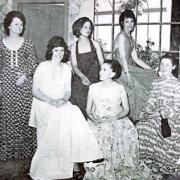Members of Newtown Amateur Dramatics Society in Laura Ashley dresses in 1974.