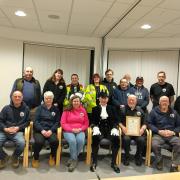 High Sheriff of Powys, Reg Cawthorne, paid a visit to the Powys branch of Blood Bikes Wales, presenting them with a High Sheriff's Award for the work they do for Powys communities.