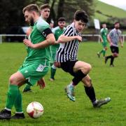 Action from Bow Street's win over Llansantffraid.