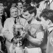 Dai Phillips lifts the Montgomeryshire Cup in 1962.
