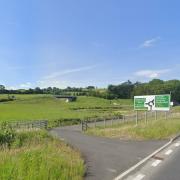 The site on the outskirts of Newtown where a planning application to build a hotel, pub, restaurant, drive through coffee shop and petrol station  has been approved. From Google Streetview.