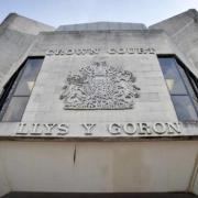 All three defendants denied all charges put to them at Swansea Crown Court on Monday, December 5