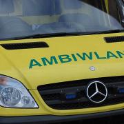 A woman had to be taken to hospital after crashing into a wall on the A44.
