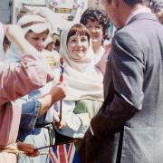Jean Higgs and Pat Burd talking to Prince Charles in Montgomery while celebrating the Queens 25th anniversary 1977.