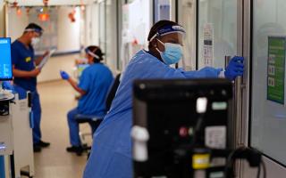 General photo showing medical staff wearing PPE on a hospital ward for Covid patients. Picture: Victoria Jones/PA Wire