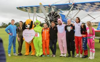 Harry Potter star James Phelps, who played Fred Weasley in the films, joined two teams of wing walkers raising money for Hope House
