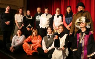The adult cast of Scrooge.