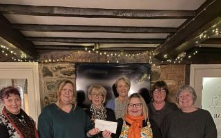 Diane and Rachel, representatives of a Llanidloes Youth Club receiving their donation from the Ladies Day committee members Michelle Brown, Helen Woosnam, Steph Wheeler, Tracey Lawrence and Carole Evans.