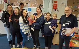 Aimee Griffiths, Sarah Edwards, Sami Vaughan, Naomi Jones and babies Lucy and Mia, Sophie Yates (Powys County Council) and presenters Kate Williams (PTHB) and Mark Cahill (Powys County Council) at the Eat Smart, Save Better workshop at Maesyrhandir