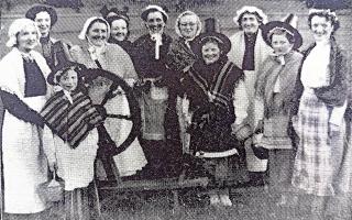 Corris Weavers pose for the camera in Llanidloes in 1970.
