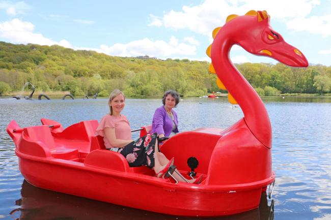 Leader of Powys County Council, Cllr Rosemarie Harris (right) and Cllr Rachel Powell, Cabinet Member for Outdoor Recreation, on board one of the pedalos that have been brought to Llandrindod Wells’ Lake Park as part of a pilot business.